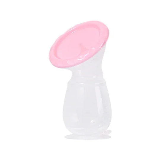 Colector de leche materna de silicona transparente con tapa rosada.