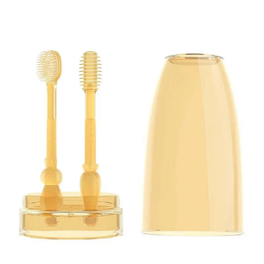 Set de dos cepillos de silicona para bebés con estuche transparente.