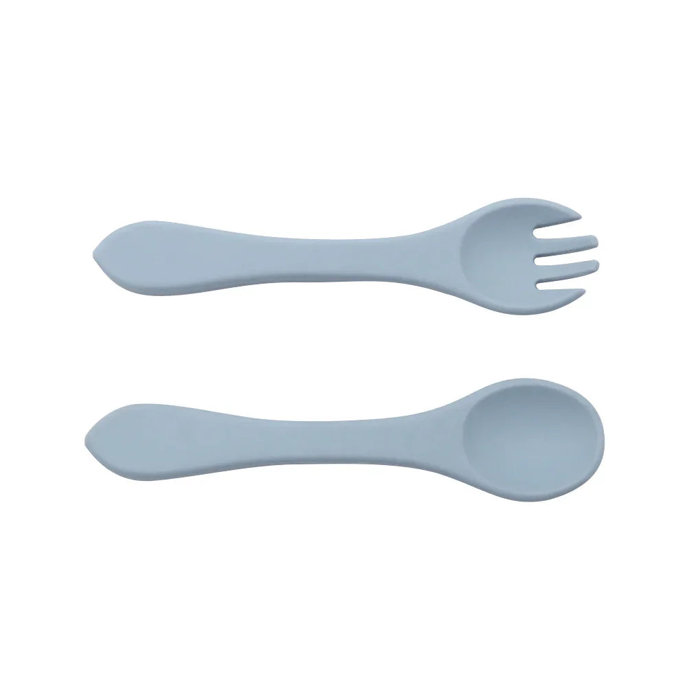 Cubiertos de silicona para bebés, set cuchara y tenedor, color azul empolvado