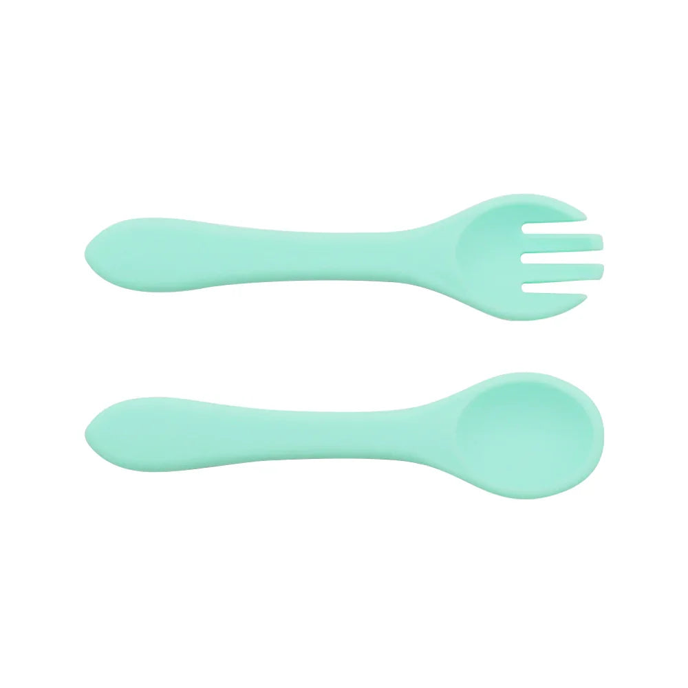 Set cuchara y tenedor de silicona para bebés, color verde menta
